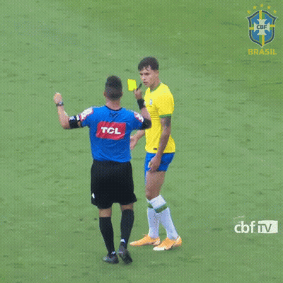 A Referee Giving A Yellow Card To A Soccer Player With A Tcl Logo On His Shirt GIF