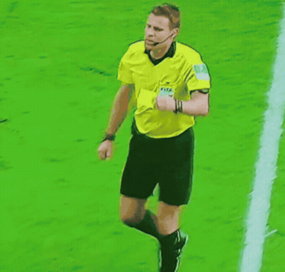 A Referee Holds Up A Red Card And A Yellow Card During A Soccer Game GIF
