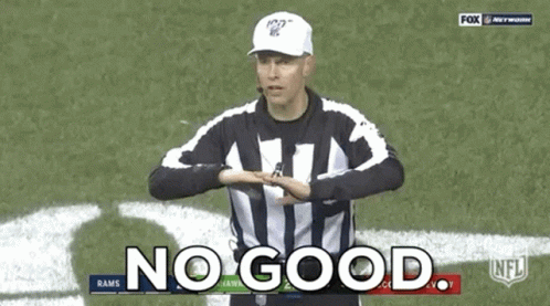 A Referee Is Making A Gesture On A Football Field That Says No Good . GIF