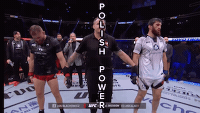 A Referee Stands Between Two Fighters With The Words Polish Power Written On The Bottom GIF