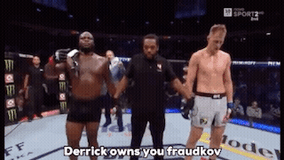 A Referee Stands Between Two Men In A Boxing Match And Says Derrick Owns You Fraudkov GIF