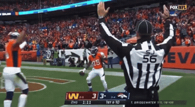 A Referee With The Number 56 On The Back Of His Shirt GIF