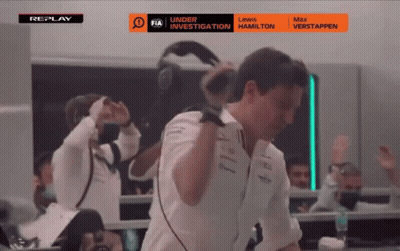 A Replay Of A Race With Lewis Hamilton And Max Verstappen On The Screen GIF