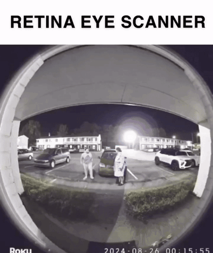 A Retina Eye Scanner Shows A Couple Standing In A Parking Lot At Night GIF