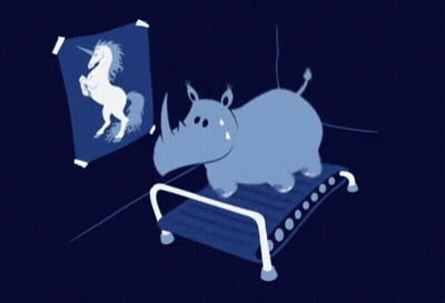 A Rhino Is Running On A Treadmill In Front Of A Unicorn Poster GIF