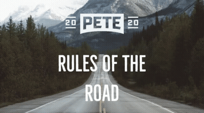 A Road With Mountains In The Background And The Words Rules Of The Road GIF