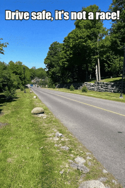 A Road With The Words Drive Safe It 'S Not A Race On It GIF