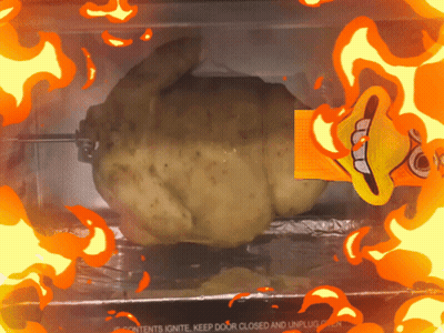 A Roasted Chicken In An Oven With Flames Surrounding It GIF
