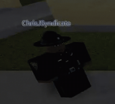 A Roblox Character Wearing A Hat And Sunglasses Is Standing On The Sidewalk . GIF