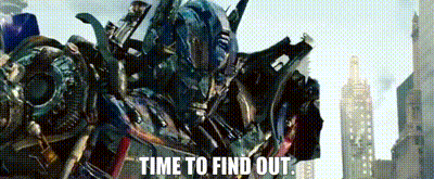 A Robot Is Standing In A City With The Words `` Time To Find Out '' Written Below It . GIF