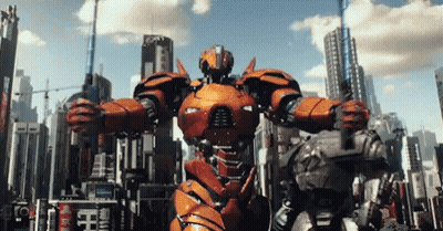 A Robot Is Standing In Front Of A City With A Sign That Says ' Emperor ' On It GIF