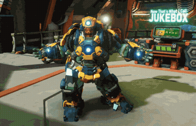 A Robot Is Standing In Front Of A Jukebox That Says " Now That 'S What I Call Jukebox " GIF