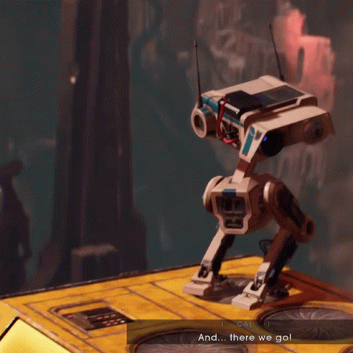 A Robot Is Standing In Front Of A Mountain With A Cliff In The Background GIF