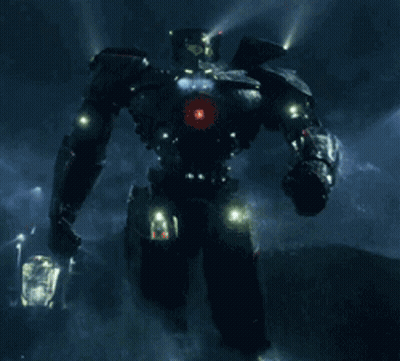 A Robot Is Standing In The Rain With A Red Light On Its Head GIF