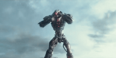 A Robot Is Standing On Its Hind Legs In Front Of A Blue Sky . GIF