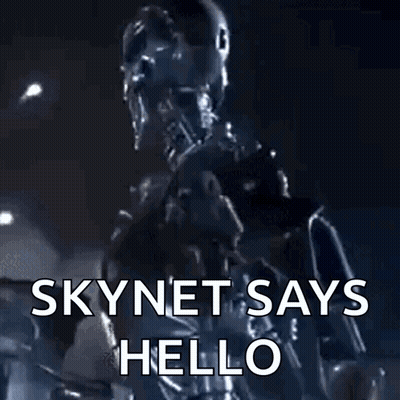 A Robot Says Skynet Says Hello With A Purple Light Behind Him GIF