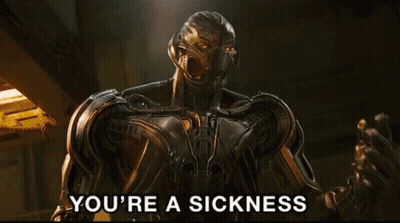 A Robot Says " You 'Re A Sickness " In Front Of A Dark Background GIF