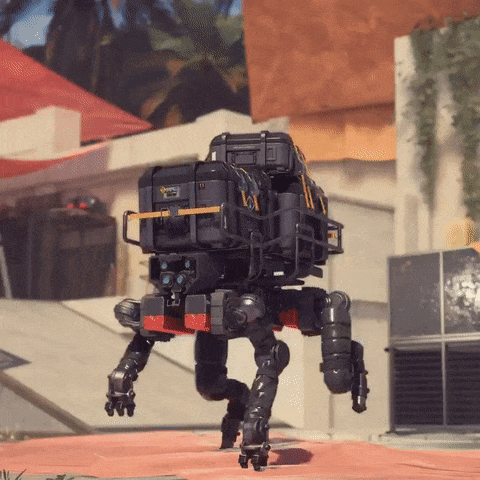 A Robot With A Briefcase On Its Back That Says ' A ' On It GIF
