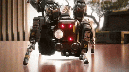 A Robot With A Flashlight And A Sticker That Says ' Warning ' GIF