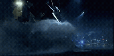 A Robot With A Red Light On Its Head Is Flying Through The Air GIF