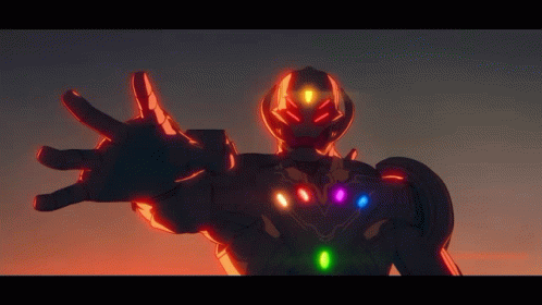 A Robot With The Infinity Stones On His Chest Is Reaching Out GIF