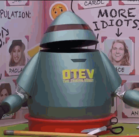 A Robot With The Word O Tev On The Front GIF