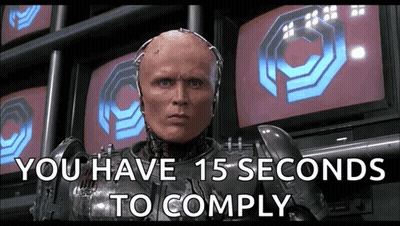 A Robot With The Words " You Have 15 Seconds To Comply " GIF