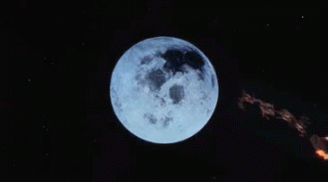 A Rocket Is Flying Past A Full Moon In Space . GIF