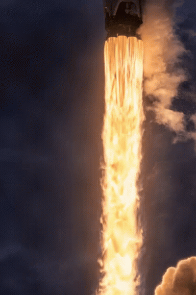 A Rocket With Flames Coming Out Of It 'S Exhaust Pipe GIF