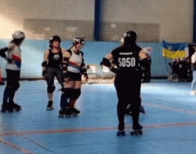 A Roller Derby Player Has The Number 5050 On The Back Of Her Shirt GIF