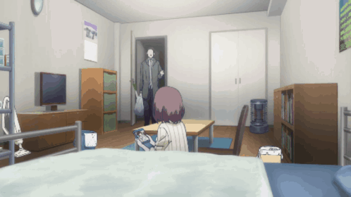 A Room With A Clock On The Wall That Says ' T ' On It GIF