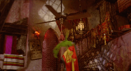 A Room With A Poster On The Wall That Says " Boxing " GIF