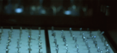 A Row Of Rings Are Displayed On A Table GIF