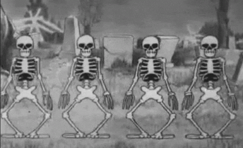 A Row Of Skeletons Are Dancing In A Cemetery In A Black And White Cartoon . GIF