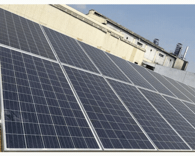 A Row Of Solar Panels On Top Of A Roof GIF