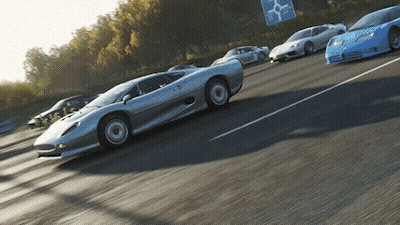 A Row Of Sports Cars Are Driving Down A Highway With A Sign That Says ' A Few Miles Ahead ' GIF