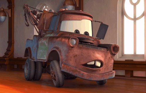 A Rusty Tow Truck From The Movie Cars Is Standing In Front Of A Window GIF