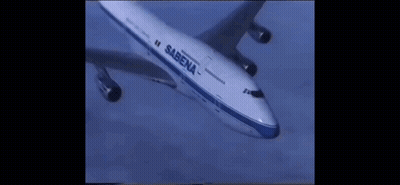 A Sabena Airplane Is Flying Through The Sky GIF