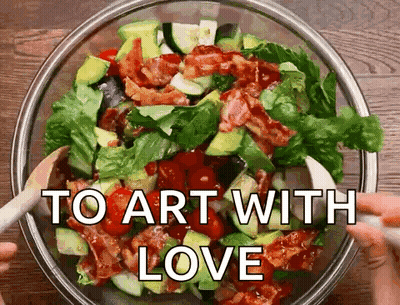 A Salad In A Bowl With The Words " To Art With Love " Above It GIF
