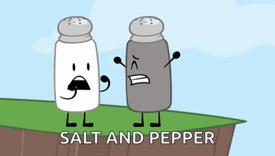 A Salt And Pepper Shaker Are Standing Next To Each Other On A Cliff . GIF