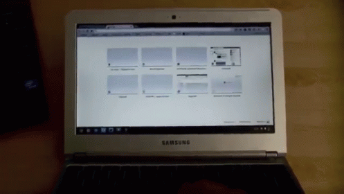 A Samsung Laptop Open To A Web Page GIF