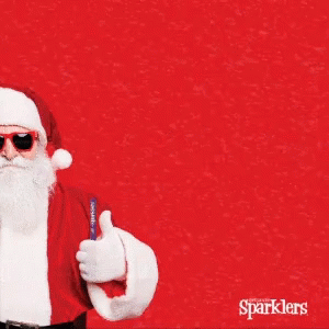 A Santa Claus Holding A Sparkler With The Words Feliz Navidad Behind Him GIF