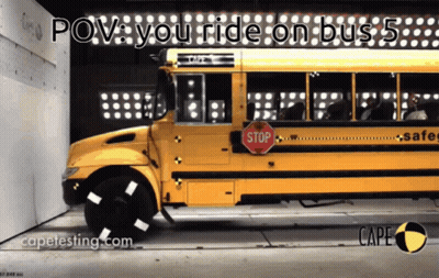 A School Bus With A Stop Sign On It GIF