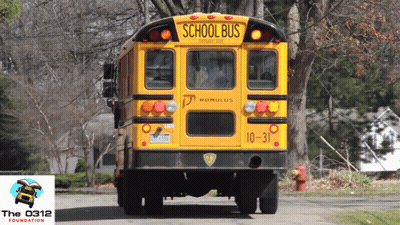 A School Bus With The Number 10-31 On It GIF