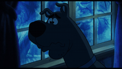 A Scooby Doo Cartoon Character Looking Out A Window With The Words Ruh-Roh Below Him GIF