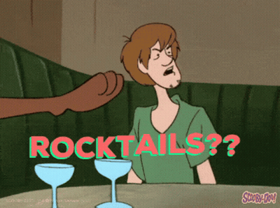 A Scooby Doo Cartoon Shows A Man Sitting At A Table GIF