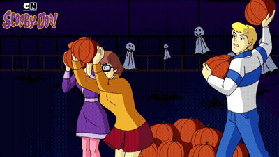 A Scooby Doo Cartoon With A Bunch Of Pumpkins And Ghosts GIF