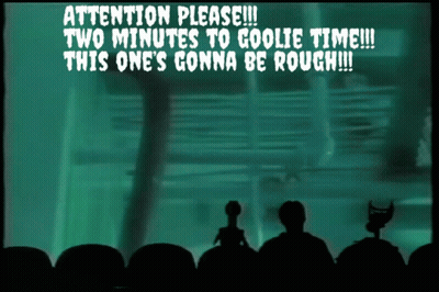 A Screen Says " Attention Please Two Minutes To Goolie Time This One 'S Gonna Be Rough " GIF