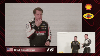 A Screen Shot Of Brad Keselowski With A Pennzoil Logo Behind Him GIF