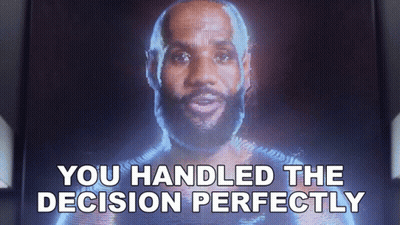 A Screen Shows A Man With The Words " You Handled The Decision Perfectly " Below Him GIF